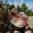 Kelsey is 5'8 and wears a full-length 2XL.