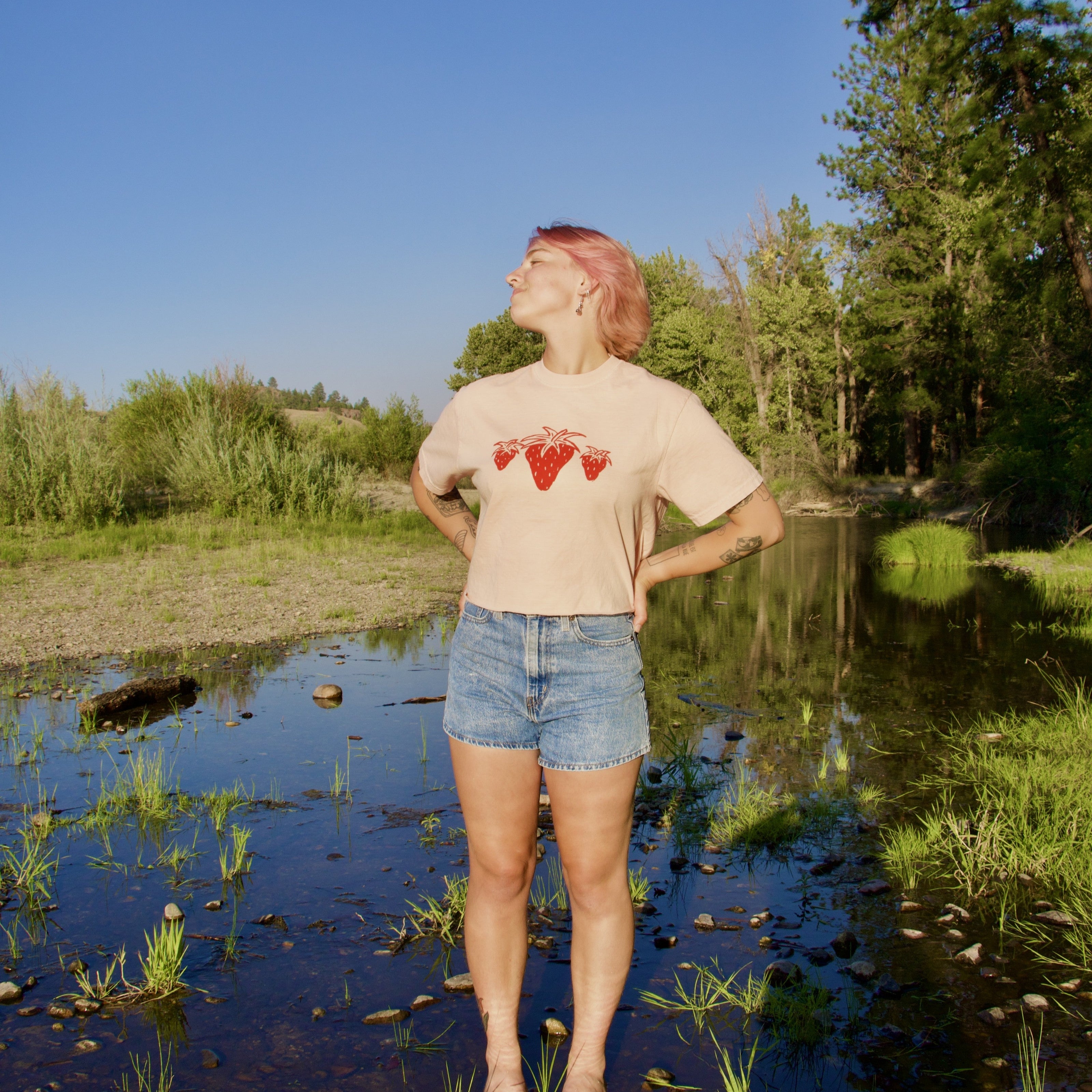 Annalyn is 5'3 and wears a cropped-length M.
