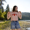 Grace is 5'2 and wears a cropped-length S.